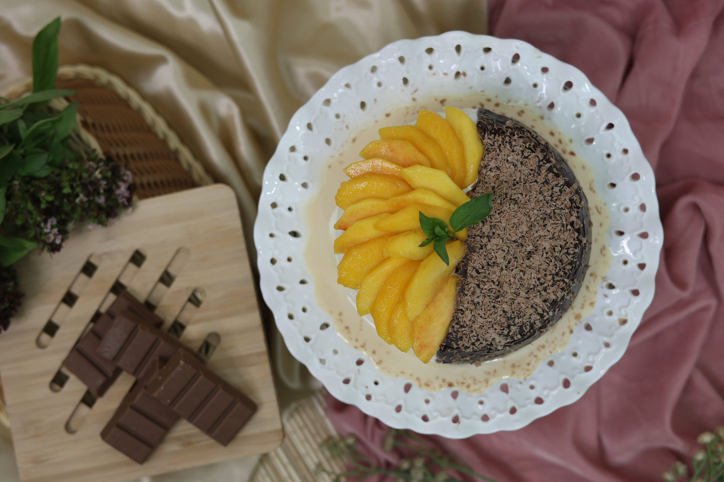 Chocolate Mango Duo Tres Leches Cake: Half indulgent chocolate and half refreshing mango, soaked in a rich Tres Leches blend, topped with fresh cream.
