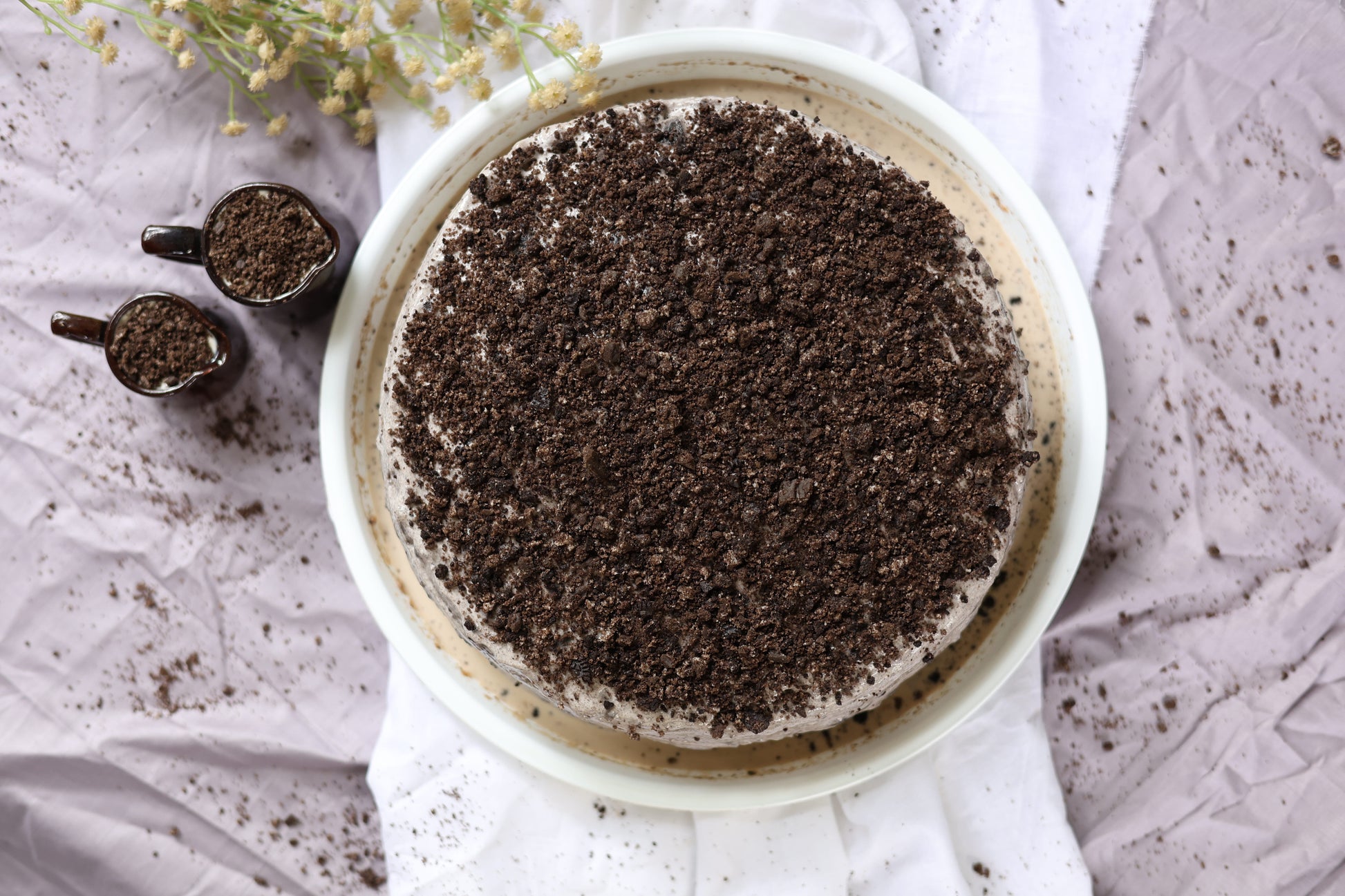 Cookies and Cream Tres Leches Cake: Oreo-infused sponge soaked in Tres Leches, topped with crunchy Oreo crumbs