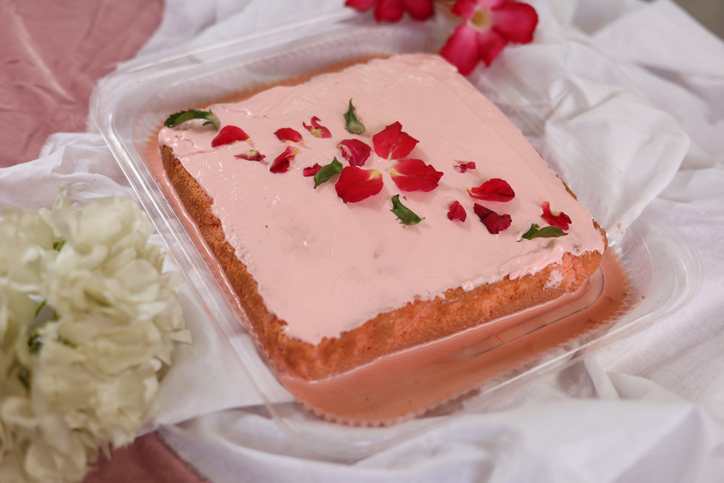 Rose Flavored Tres Leches Cake: Soft sponge soaked in a delicate rose-infused Tres Leches blend, topped with rose-infused cream and a hint of floral sweetness.