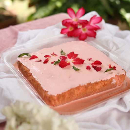 Rose Flavored Tres Leches Cake: Soft sponge soaked in a delicate rose-infused Tres Leches blend, topped with rose-infused cream and a hint of floral sweetness.