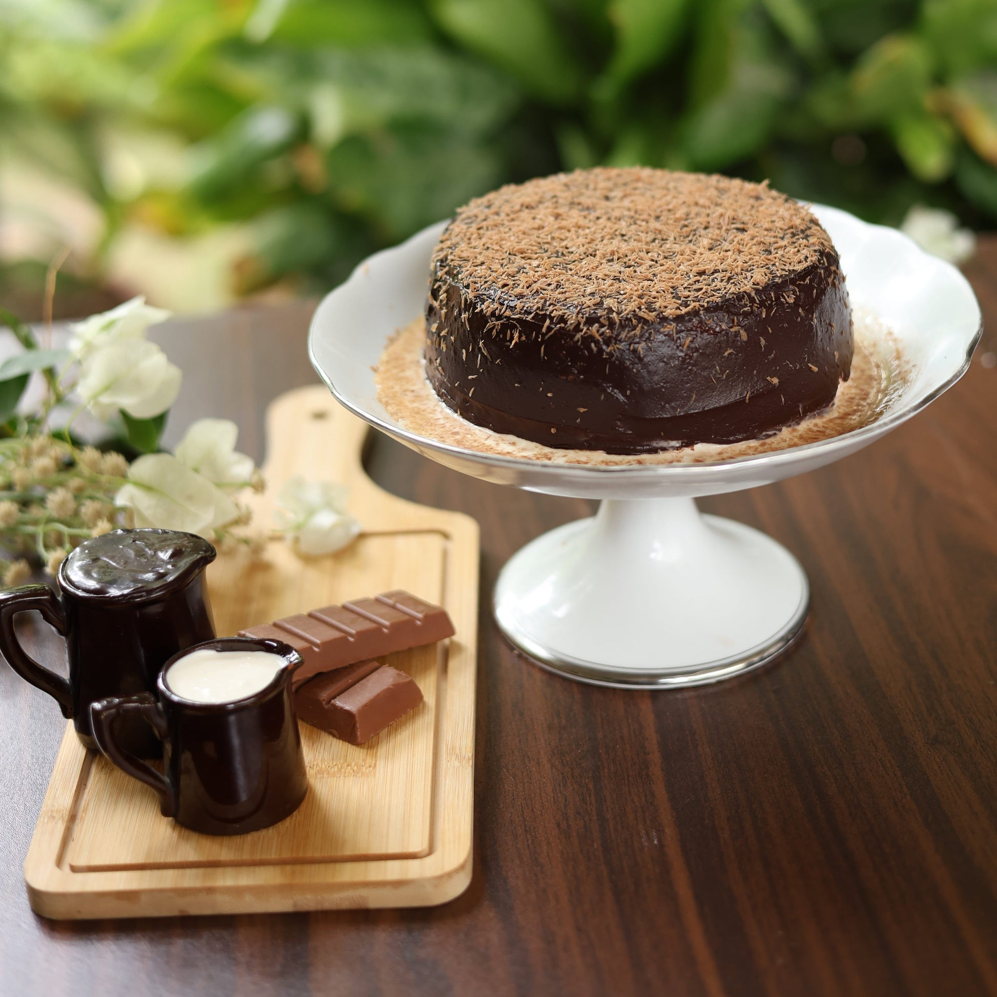 Sugar-Free Chocolate Tres Leches Cake: A rich, freshly baked cake soaked in our signature sugar-free Tres Leches blend, with layers of decadent chocolate.